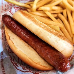 Kids hot dog with french fries. **contains soy, egg, wheat, dairy, may contain fish**