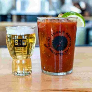Wheatley vodka, housemade bloody Mary mix, beer back. Garnished with lime and olives.