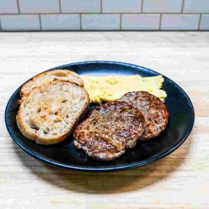 Eggs, Choice of Bacon, Sausage Patty or Grilled Ham, Choice of Sourdough or English Muffin.