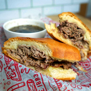Smoked thin slice beef and provolone cheese on a hoagie roll with au jus. **contains wheat, egg, soy, dairy**