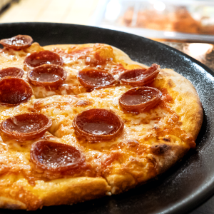 Kid s pizza with choice of 1 topping. **contains wheat, dairy**