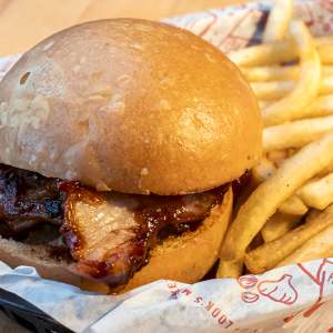 Kids bbq pulled pork sandwich with french fries. **contains soy, egg, wheat, dairy, fish**