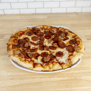 Look s Italian Sausage, Pepperoni, Tomato Sauce, and Cheese.