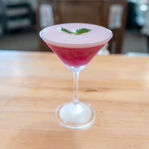 GIN, MARASCHINO LIQUEUR, LEMON JUICE, DRAGONFRUIT SIMPLE SYRUP, MUDDLED BASIL, EGGWHITE.