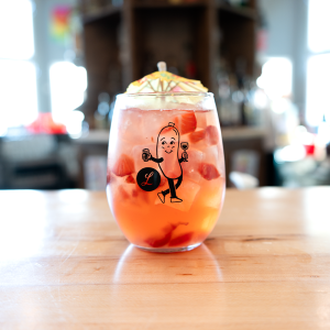 ROSE WINE, POMEGRANATE JUICE, LEMON JUICE, ORANGE LIQUEUR, COGNAC, FRESH STRAWBERRIES, RASPBERRIES & STONEFRUIT.
