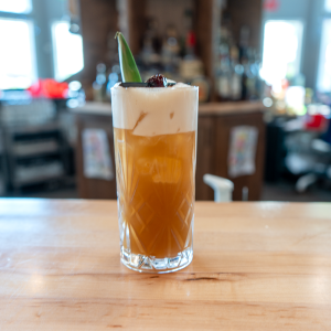 COCONUT RUM, DARK OVERPROOF RUM, COFFEE LIQUEUR, PINEAPPLE JUICE, LEMON JUICE.